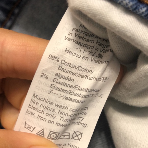 The High-Rise Slim Crop Boyjean in Medium Wash Ripped Knee Raw Hem Straight Leg - Picture 12 of 16